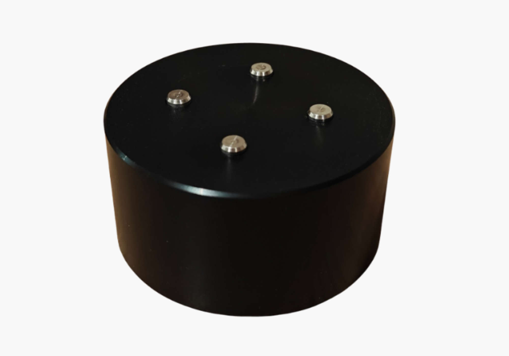 Black circular grounding foot with four metal screw posts on top